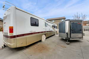 View of side of property featuring crawl space and an outdoor structure