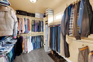 Walk in closet featuring carpet