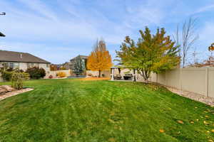 Fenced backyard featuring a patio area