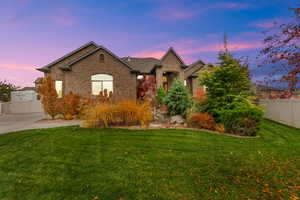 View of front of property with brick siding