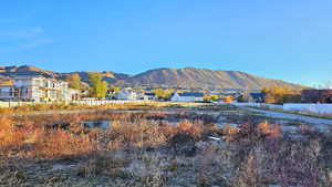 Mountain view featuring nearby suburban area