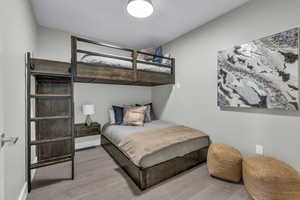 Bedroom with wood finished floors