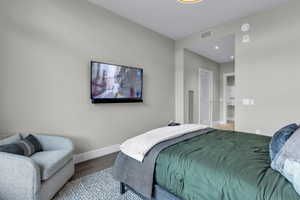 Bedroom featuring a closet and wood finished floors