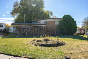 View of front of property featuring brick siding