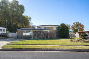 View of front of property featuring brick siding