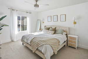Bedroom with carpet and ceiling fan