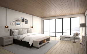 Primary suite with hardwood floors, wood ceilings, and forever views.