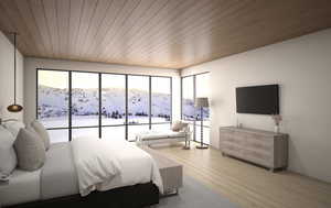 Bedroom with hardwood / wood-style flooring and wooden ceiling