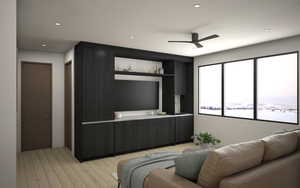 Loft living area with a ceiling fan, Hardwood floors, and recessed lighting