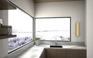 Pantry with plenty of natural light, stone countertops, and mountain and lake views.