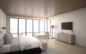 Primary suite with hardwood floors, wood ceilings, and forever views.
