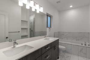 Bathroom featuring a marble finish shower, double vanity, a bath, light marble finish flooring, and recessed lighting