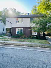 Traditional home with brick siding