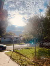 View of yard featuring a mountain view. Looking East