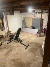 Exercise area featuring concrete flooring. SUB level, APT 2