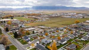 View of property location with nearby suburban area and a mountainous background