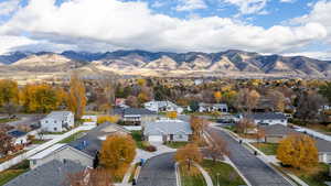 Aerial perspective of suburban area with mountains