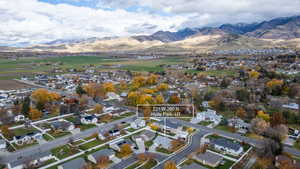 View of property location with nearby suburban area and a mountain backdrop