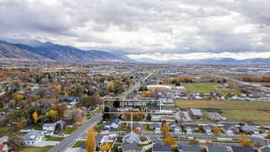Aerial view of residential area featuring mountains
