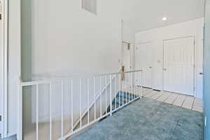 Tile entry, desert them colors throughout the property.