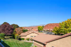 View of mountain backdrop with nearby suburban area