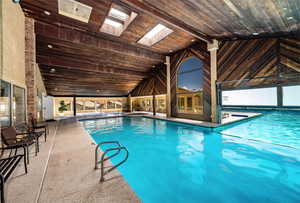 Indoor community pool with a skylight