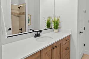 Full bath with vanity