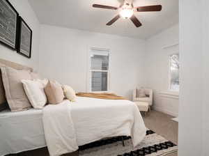 Bedroom with carpet flooring and a ceiling fan