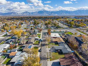 Aerial view of residential area with a mountainous background