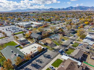 Aerial view of residential area featuring a mountainous background