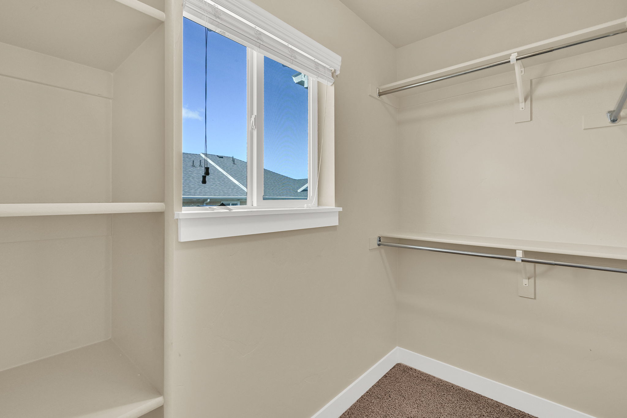 Primary Bedroom Walk in closet