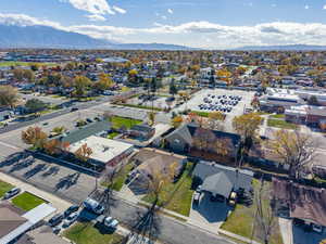 Aerial view of residential area featuring a mountain backdrop
