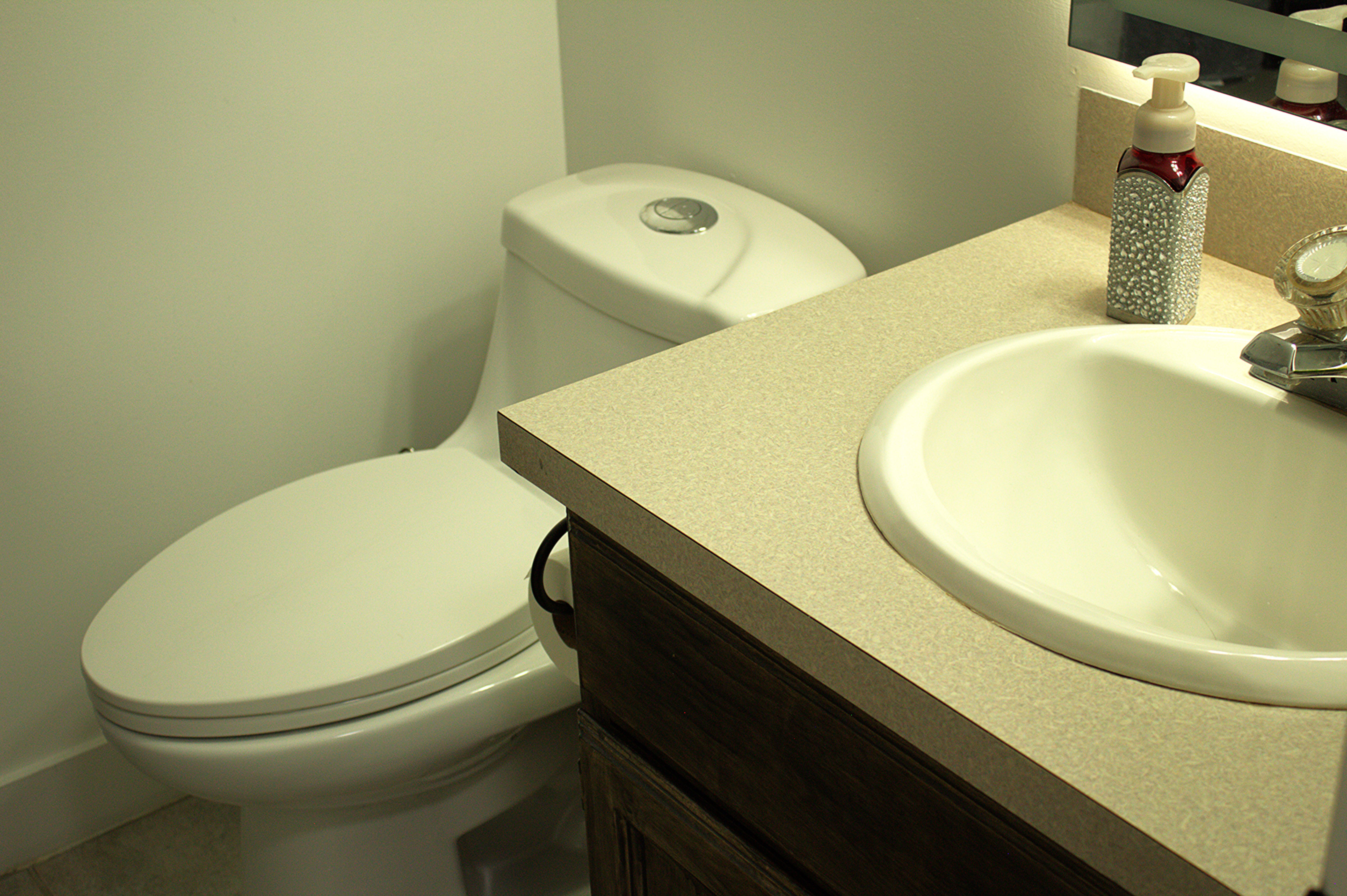 Bathroom with vanity and toilet