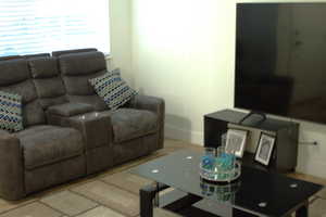 Living room featuring baseboards