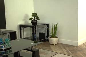 Office view of wood finished floors and baseboards