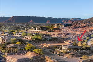 View of mountain backdrop with nearby suburban area