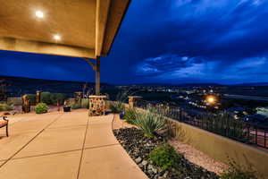 Patio at night featuring a patio