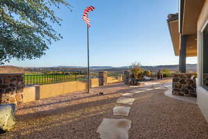 View of yard featuring a mountain view and a patio area