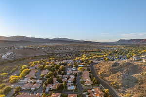 Aerial view of residential area with a mountain backdrop