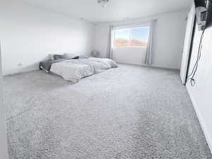 Bedroom featuring baseboards