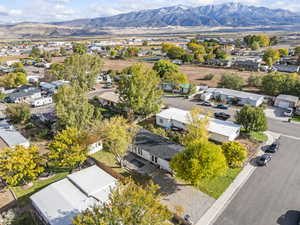 Aerial view of residential area featuring a mountain backdrop