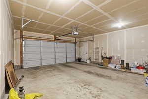 Garage featuring a garage door opener