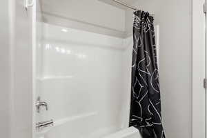 Bathroom featuring shower / tub combo