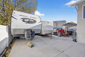 View of parking / parking lot - concrete driveway