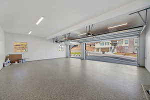 Garage featuring a garage door opener