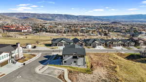 Aerial view of residential area with a mountain backdrop
