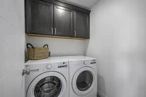 Out of sight but never out of style. This laundry space is as practical as it is polished.