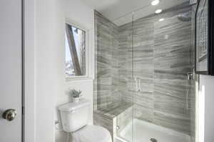 Dual sinks = relationship saver. Plus a walk-in shower that actually feels spa-worthy.