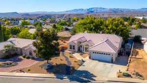 View from above of property with a mountainous background