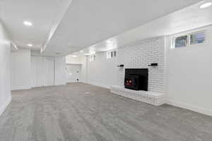 Basement with carpet floors and recessed lighting